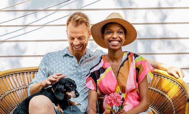 Couple sitting with dog